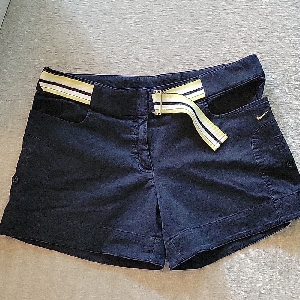 NIKE dark blue cotton casual shorts with striped belt.   Size is 8 - 10.